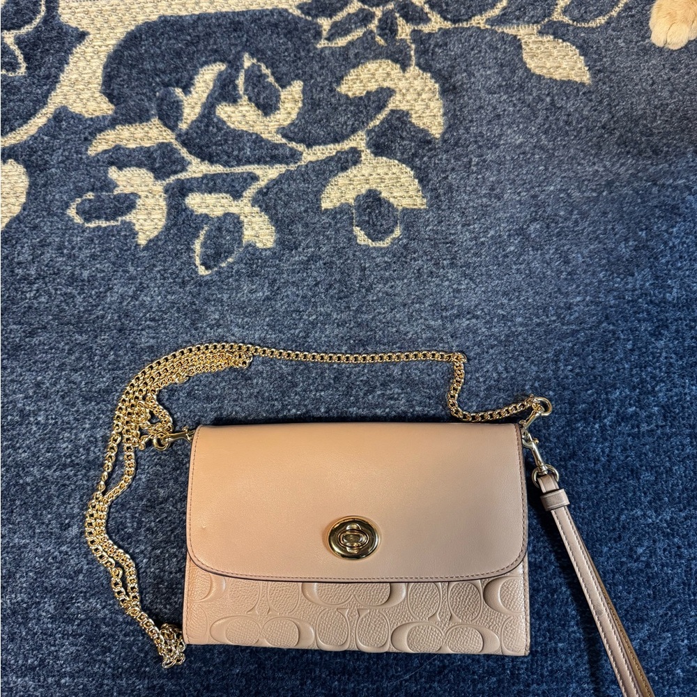 Coach Tan Crossbody Bag with Chain Strap and Flap Closure